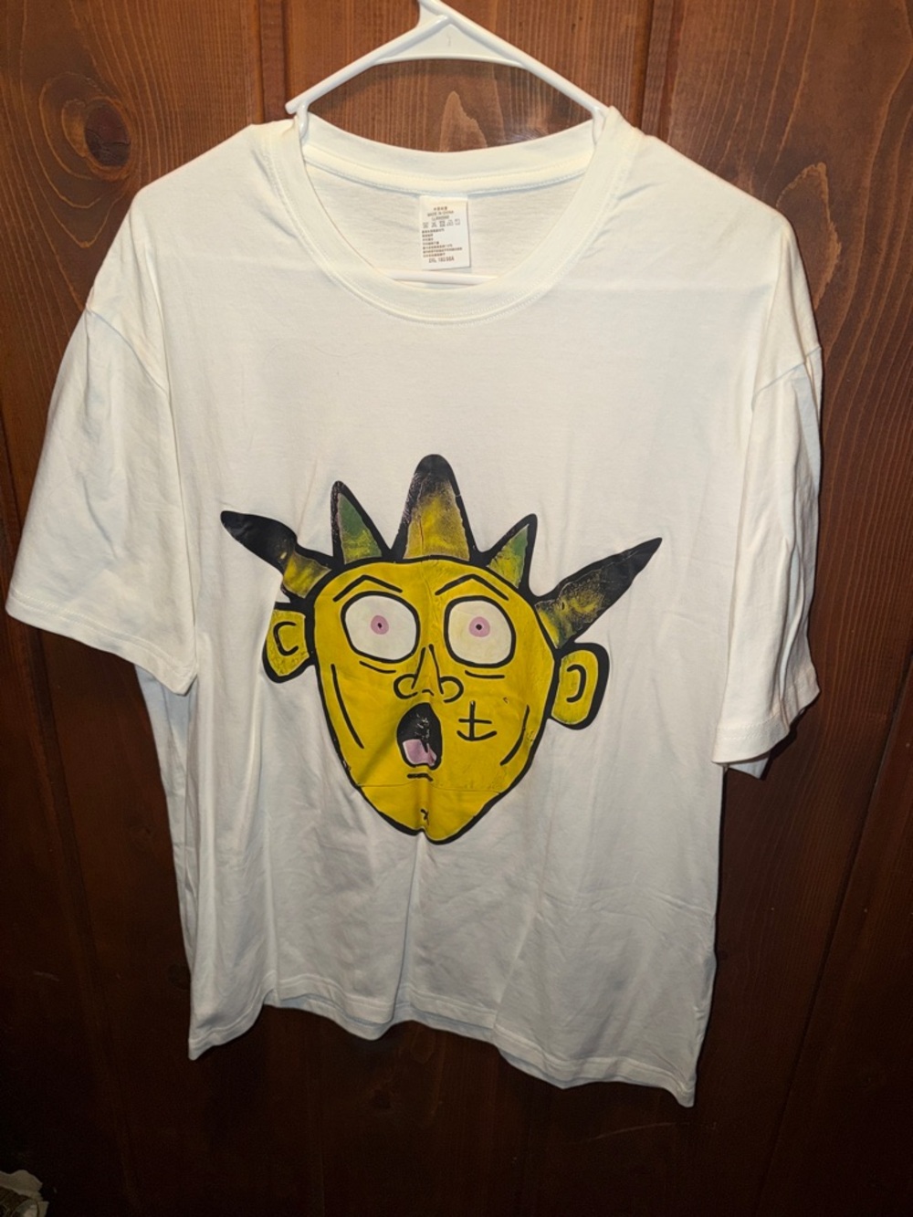 White Graphic Tee with Yellow Cartoon Face